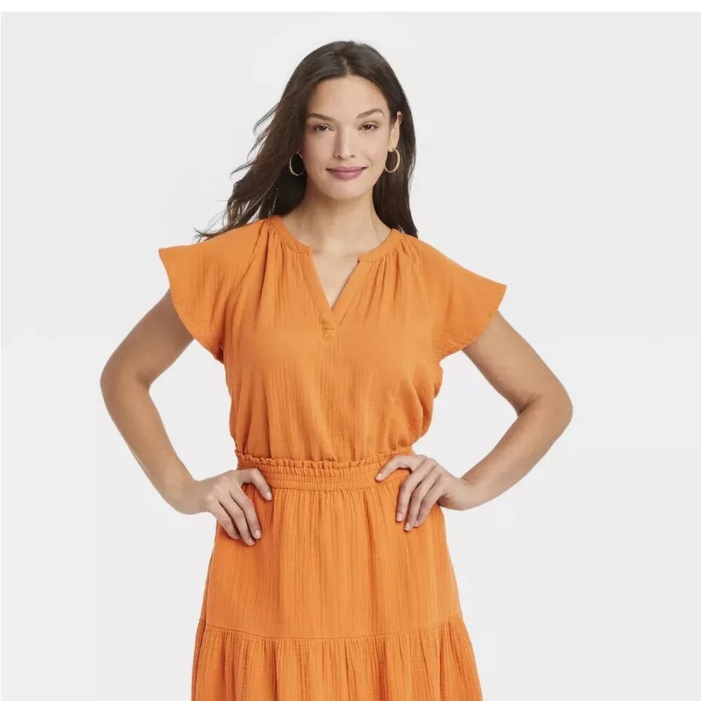 Flutter Short Sleeve Universal Thread Top NWT